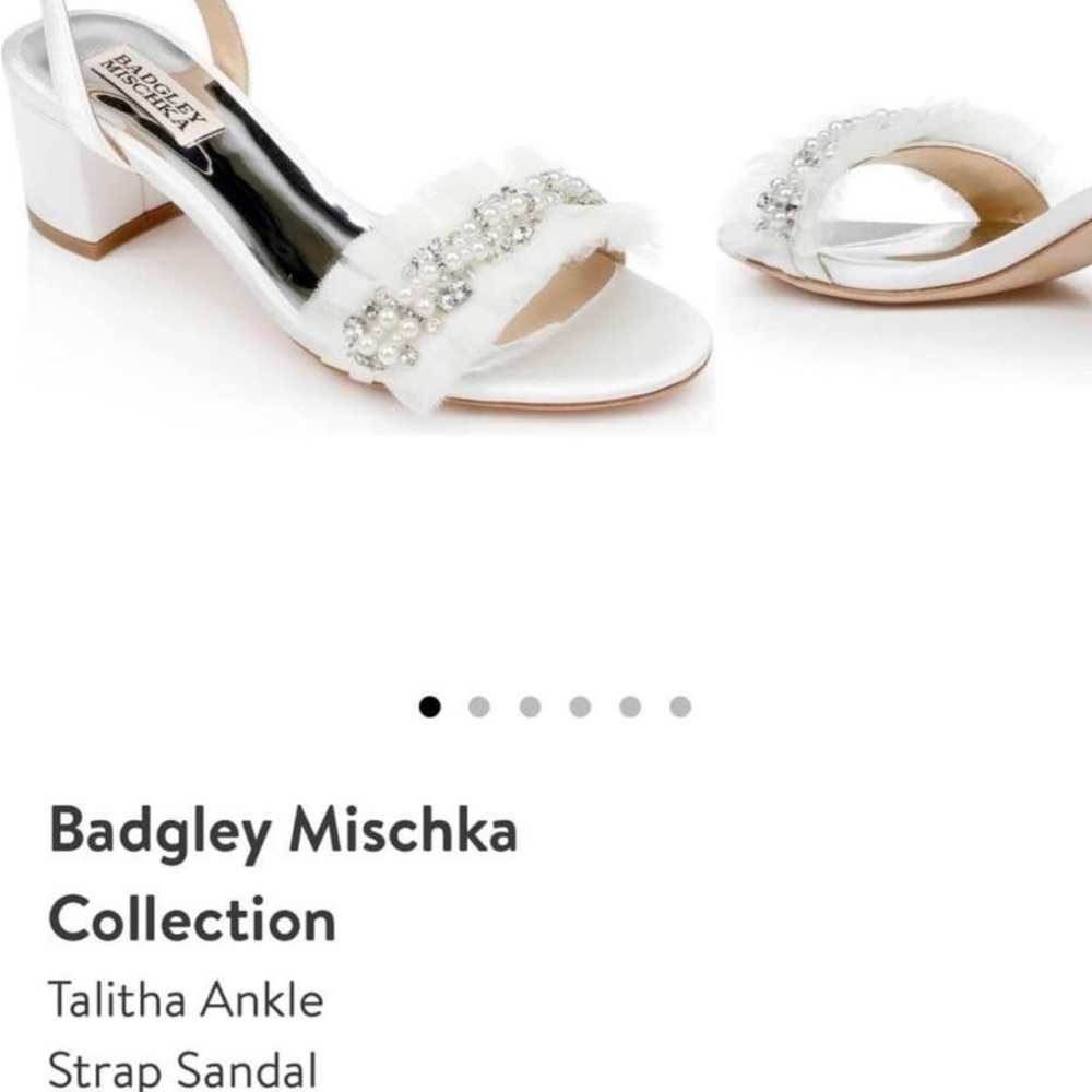 Like new. Wore for 4 hours on wedding day.
